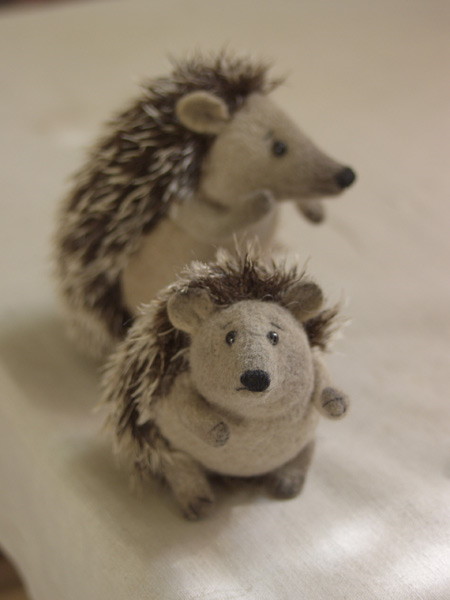 two stuffed hedgehogs