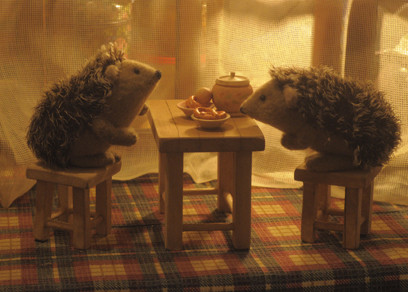 hedgehogs drinking tea