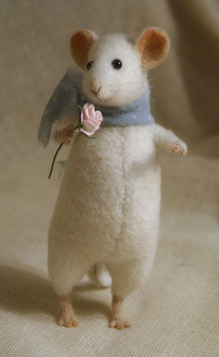 white mouse with a rose