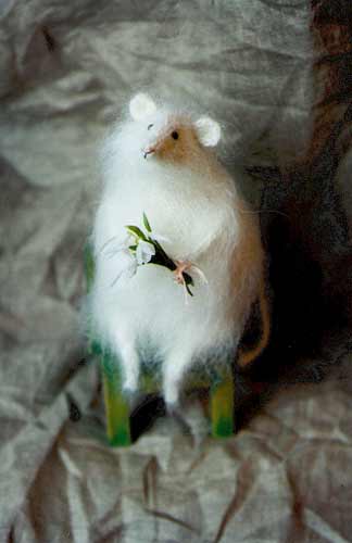 stuffed mouse with flowers