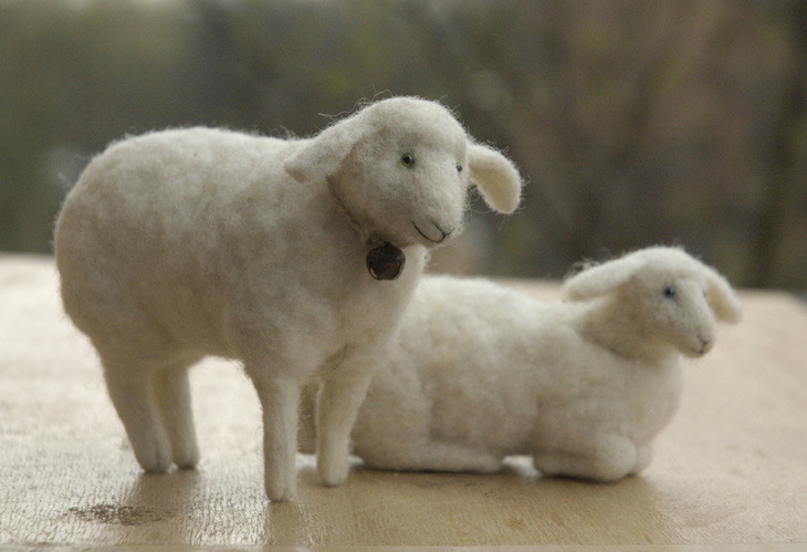 needle felted sheep - sitting and lying down
