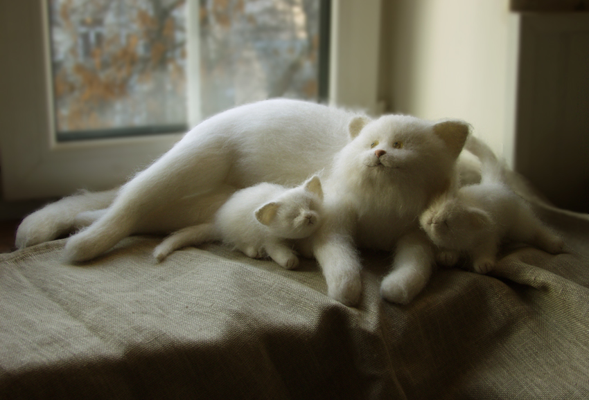 stuffed cat with kittens