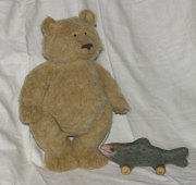 stuffed bear with a salmon